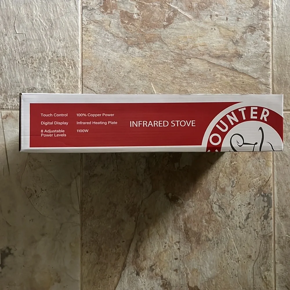 Infrared stove by chefs counter. New